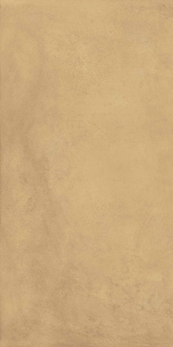 Dettaglio piastrella in gres porcellanato effetto metallo. Plate di ceramiche keope 60x120 colore Brass