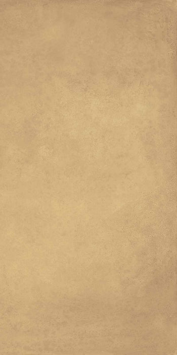 Dettaglio piastrella in gres porcellanato effetto metallo. Plate di ceramiche keope 60x120 colore Brass