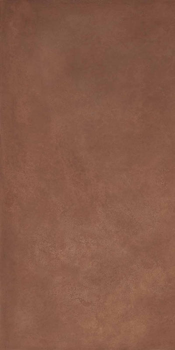 Dettaglio piastrella in gres porcellanato effetto metallo. Plate di ceramiche keope 60x120 colore Copper