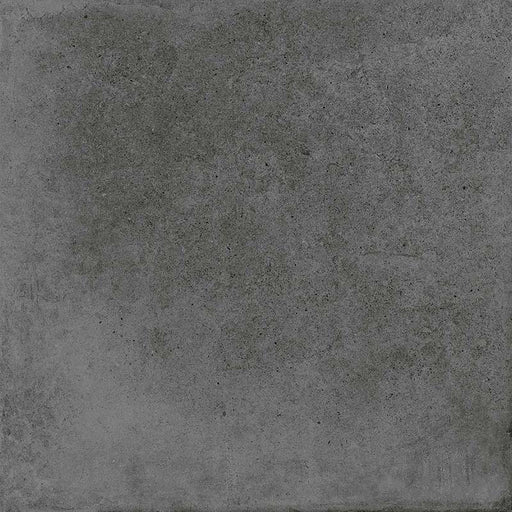 Dettaglio piastrella per pavimenti e rivestimenti effetto cemento industriale. Scopri Moov di Ceramiche Keope nel formato 60x60, colore Anthracite.