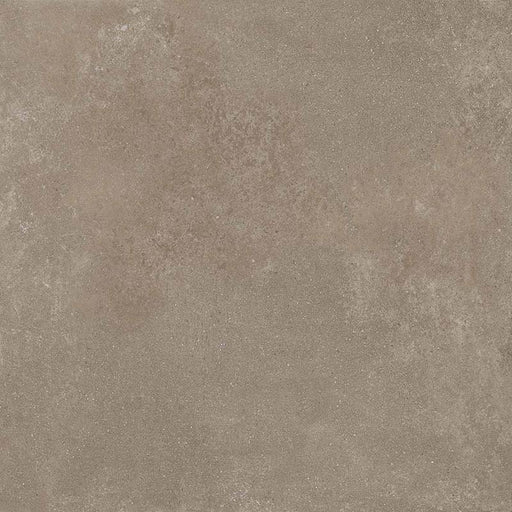 Dettaglio piastrella per pavimenti e rivestimenti effetto cemento industriale. Scopri Moov di Ceramiche Keope nel formato 60x60, colore Moka.