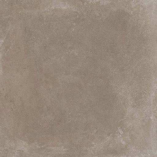 Dettaglio piastrella per pavimenti e rivestimenti effetto cemento industriale. Scopri Moov di Ceramiche Keope nel formato 60x60, colore Moka.