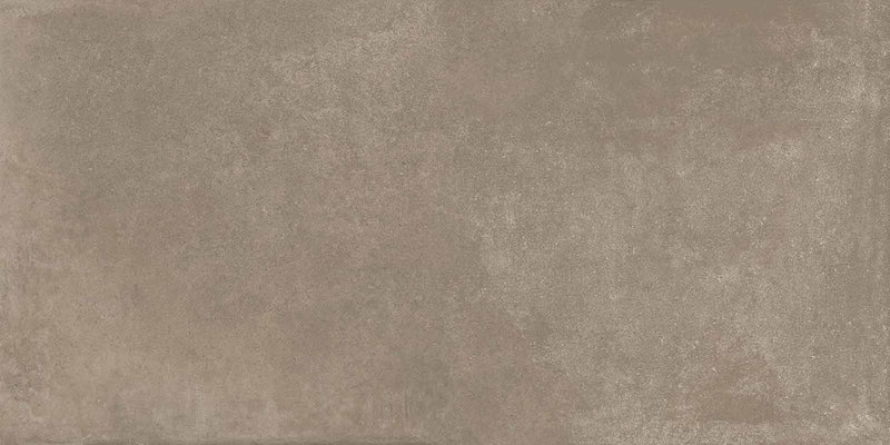 Dettaglio piastrella per pavimenti e rivestimenti effetto cemento industriale. Scopri Moov di Ceramiche Keope nel formato 60x120, colore Moka.