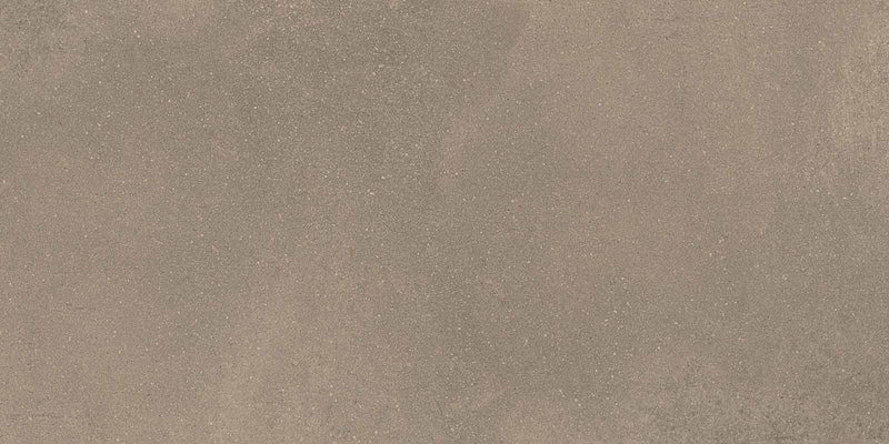 Dettaglio piastrella per pavimenti e rivestimenti effetto cemento industriale. Scopri Moov di Ceramiche Keope nel formato 60x120, colore Moka.