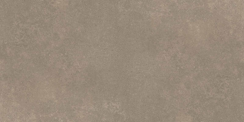 Dettaglio piastrella per pavimenti e rivestimenti effetto cemento industriale. Scopri Moov di Ceramiche Keope nel formato 60x120, colore Moka.