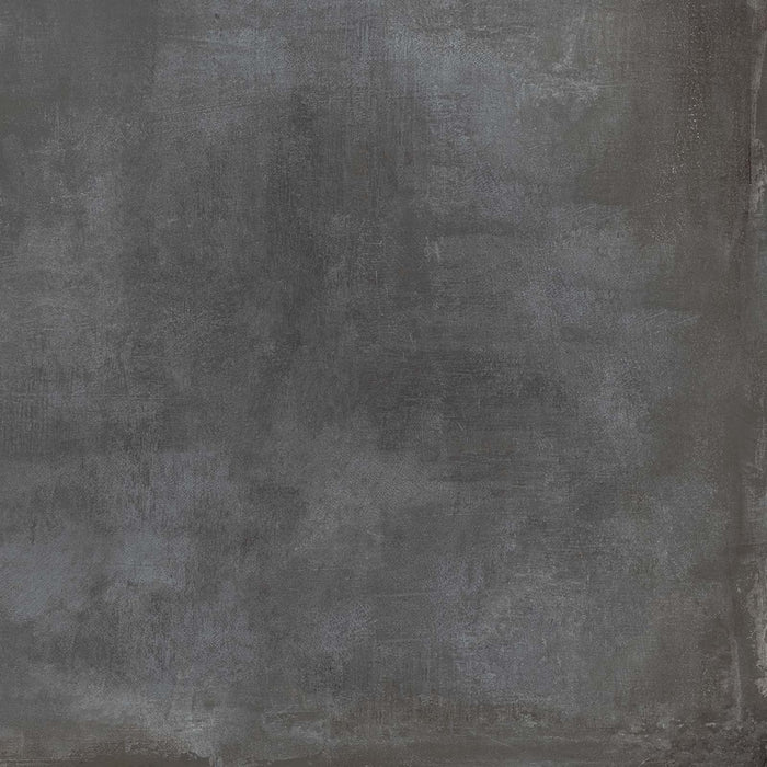 Dettaglio piastrella in gres porcellanato effetto cemento industriale. Noord di ceramiche keope 120x120 colore Anthracite