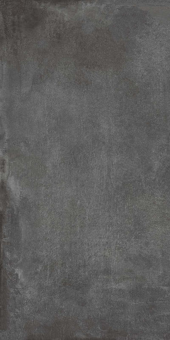 Dettaglio piastrella in gres porcellanato effetto cemento industriale. Noord di ceramiche keope 60x120 colore Anthracite