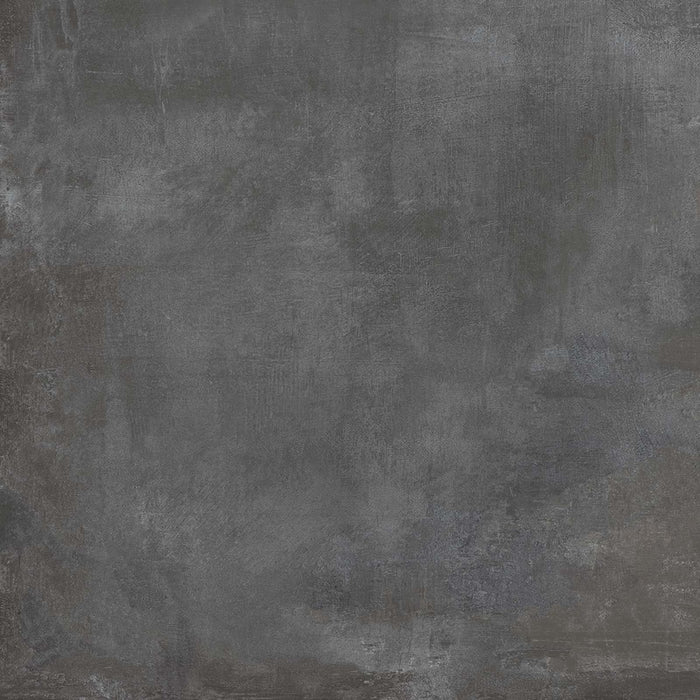 Dettaglio piastrella in gres porcellanato effetto cemento industriale. Noord di ceramiche keope 80x80 colore Anthracite
