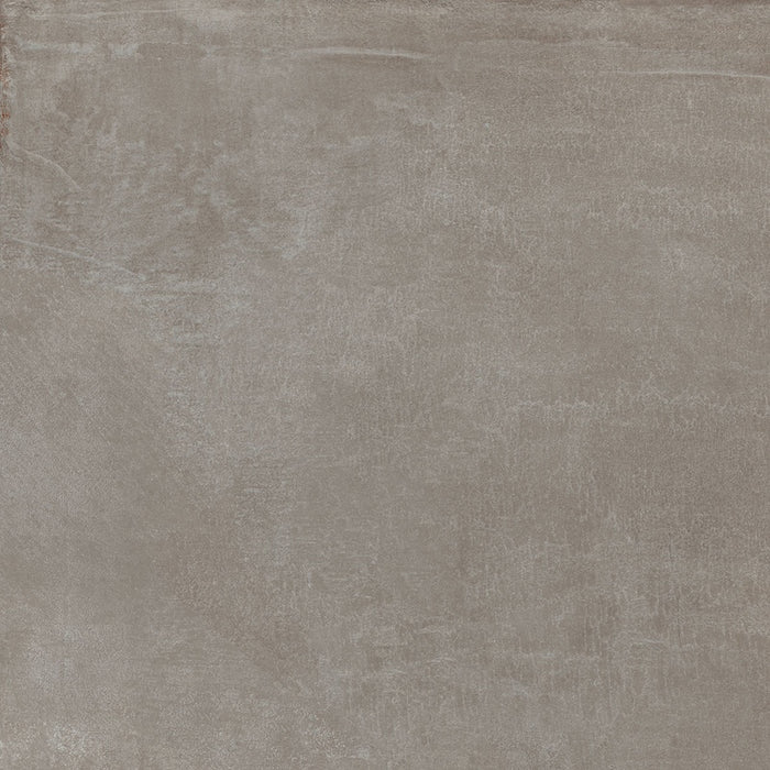 Dettaglio piastrella in gres porcellanato effetto cemento industriale. Noord di ceramiche keope 60x60 colore Tauoe
