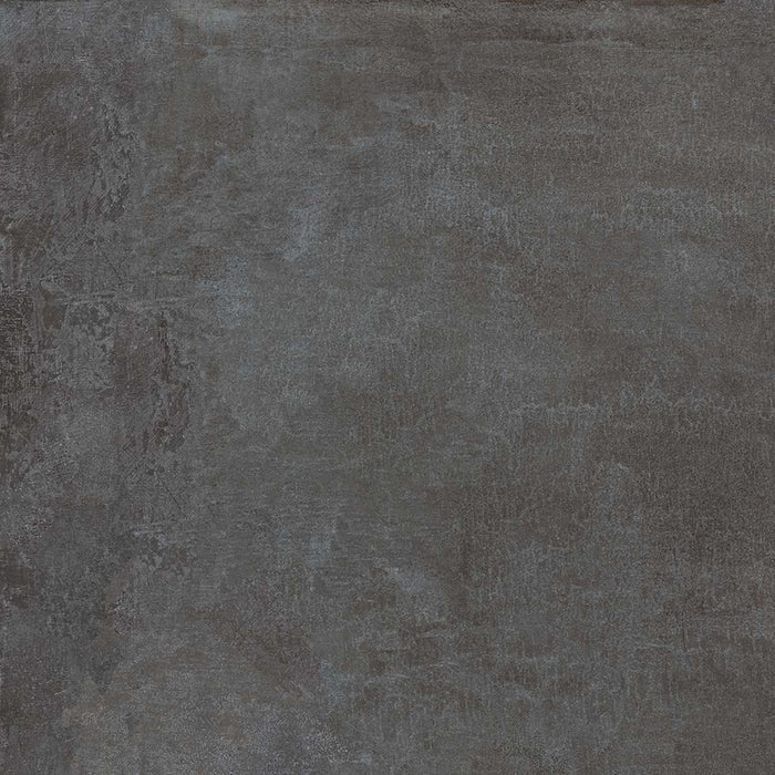 Dettaglio piastrella in gres porcellanato effetto cemento industriale. Noord di ceramiche keope 60x60 colore Anthracite