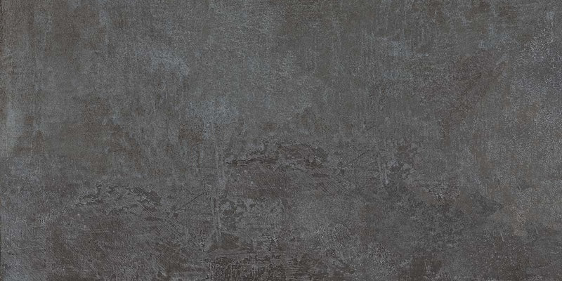 Dettaglio piastrella in gres porcellanato effetto cemento industriale. Noord di ceramiche keope 30x60 colore Anthracite
