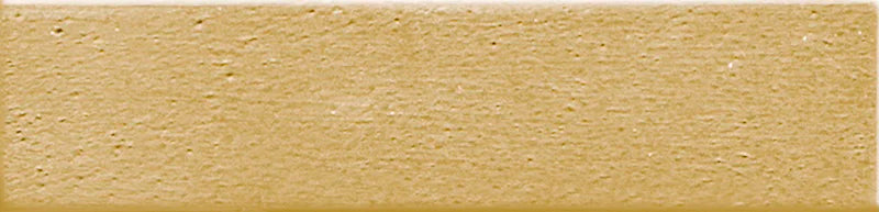 Dettaglio piastrella da rivestimento in gres porcellanato effetto materico e effetto mattoncino 4,5x18,6 cm, della collezione Koinè, colore Ocra, di Ceramica Settecento