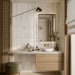 Bagno con mobile in legno e piano in marmo, rivestimento in gres porcellanato effetto mattoncino lucido a rilievo della collezione Life di Ceramica Rondine, formato 4.8x45 cm, colore 3D Slide Ivory