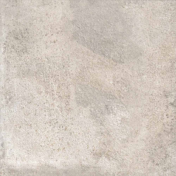 Dettaglio piastrella in gres porcellanato effetto cemento anticato. Collezione Lucania di Idea Ceramica, Colore Policoro Grigio Formato quadrato 60x60