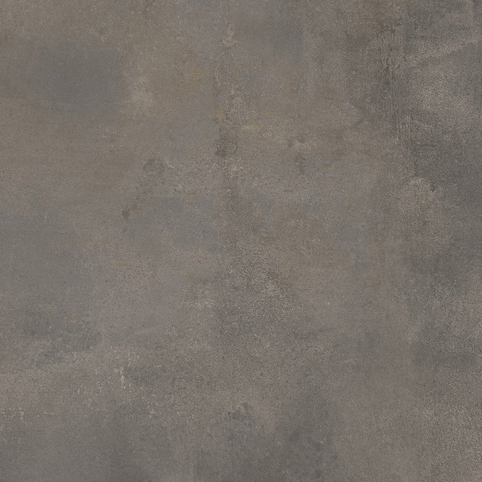 Dettaglio piastrella da pavimento e rivestimento in gres porcellanato effetto cemento industriale della collezione Make di Gardenia Orchidea, formato 60x60, colore Antracite Corten
