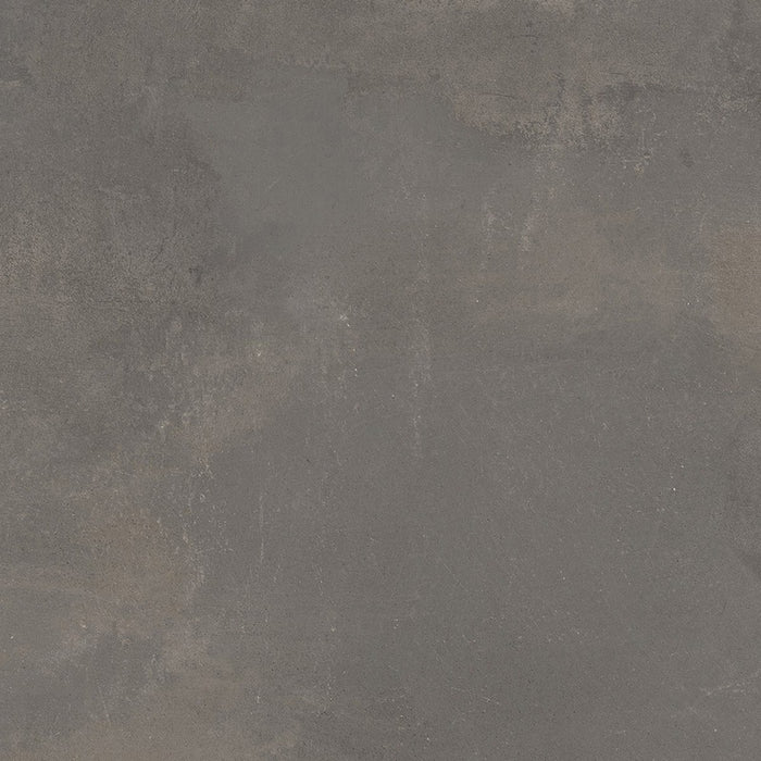 Dettaglio piastrella da pavimento e rivestimento in gres porcellanato effetto cemento industriale della collezione Make di Gardenia Orchidea, formato 60x60, colore Antracite Corten