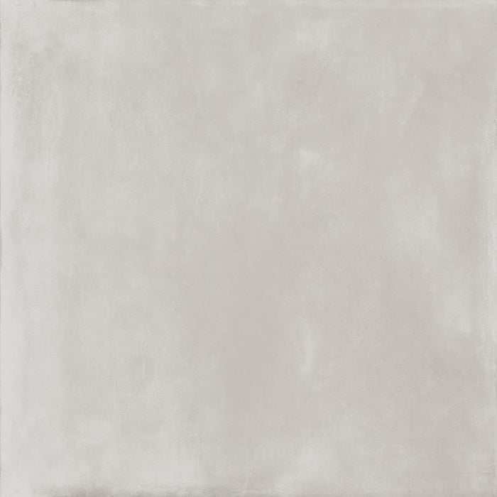 Dettaglio piastrella da pavimento e rivestimento in gres porcellanato effetto cemento industriale della collezione Make di Gardenia Orchidea, formato 100x100, colore Bianco