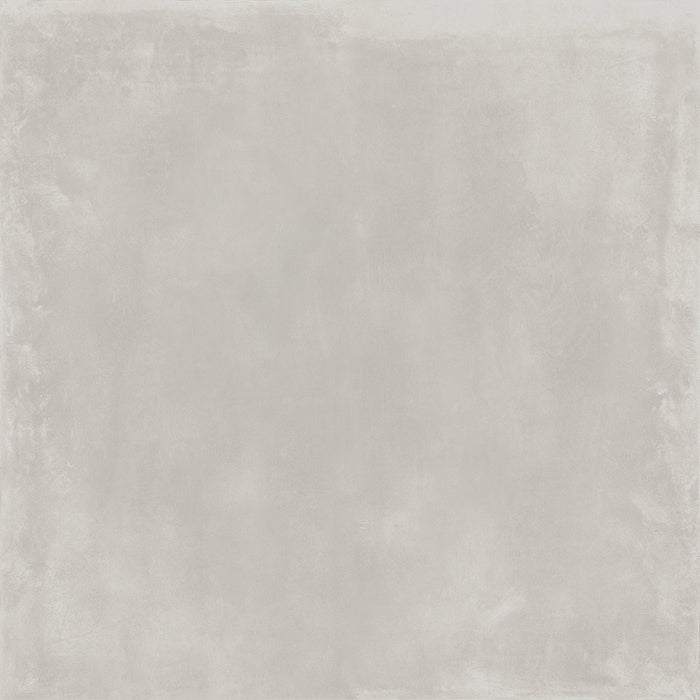 Dettaglio piastrella da pavimento e rivestimento in gres porcellanato effetto cemento industriale della collezione Make di Gardenia Orchidea, formato 100x100, colore Bianco