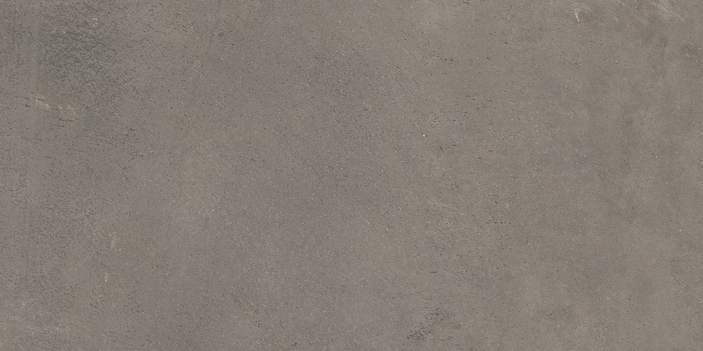 Dettaglio piastrella da pavimento e rivestimento in gres porcellanato effetto cemento industriale della collezione Make di Gardenia Orchidea, formato 30x60, colore Grigio Corten