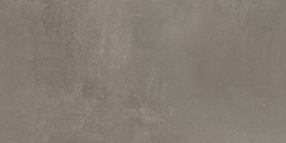 Dettaglio piastrella da pavimento e rivestimento in gres porcellanato effetto cemento industriale della collezione Make di Gardenia Orchidea, formato 30x60, colore Grigio Corten