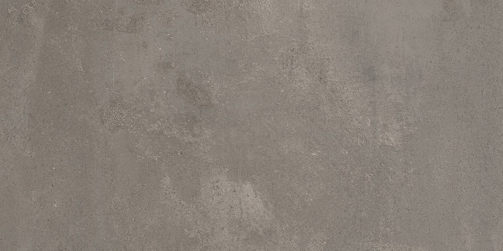 Dettaglio piastrella da pavimento e rivestimento in gres porcellanato effetto cemento industriale della collezione Make di Gardenia Orchidea, formato 30x60, colore Grigio Corten