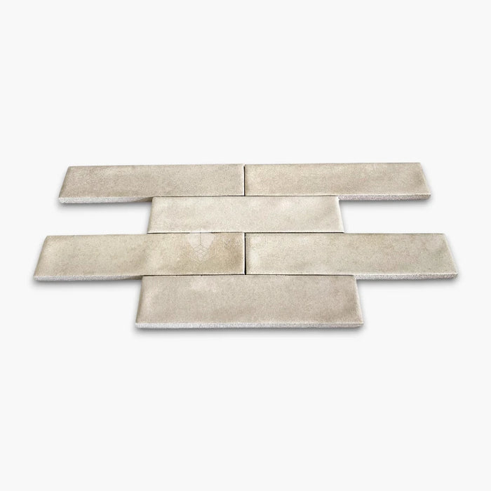 Rivestimento in gres porcellanato effetto mattoncino opaco 5x20 cm, collezione Marrakech Ivory di Ceramica Rondine. Piastrelle avorio con posa a correre sfalsata per pareti di bagno e cucina.