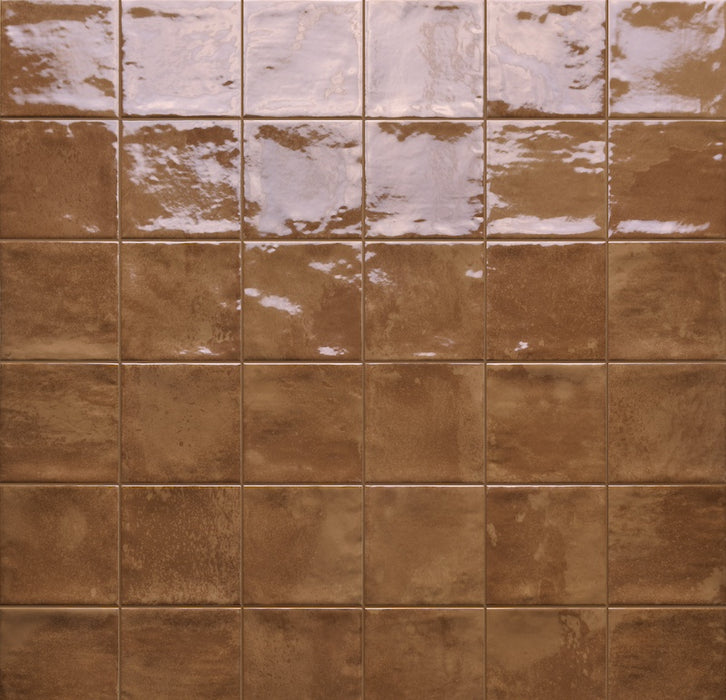 Dettaglio piastrella per rivestimento in gres porcellanato effetto mattoncino lucido 10x10 cm della collezione Marrakech, colore Copper di Ceramica Rondine