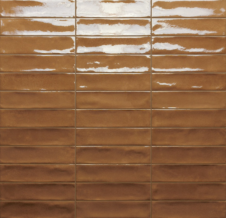 Dettaglio posato piastrella per rivestimento in gres porcellanato effetto mattoncino lucido 4.8x20 cm della collezione Marrakech, colore Copper di Ceramica Rondine