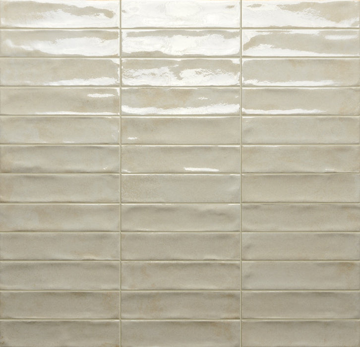 Dettaglio posato piastrella per rivestimento in gres porcellanato effetto mattoncino lucido 4.8x20 cm della collezione Marrakech, colore Ivory di Ceramica Rondine