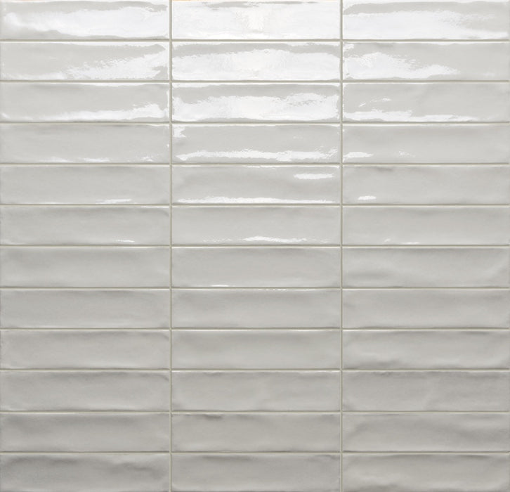 Dettaglio posato piastrella per rivestimento in gres porcellanato effetto mattoncino lucido 4.8x20 cm della collezione Marrakech, colore Total White di Ceramica Rondine