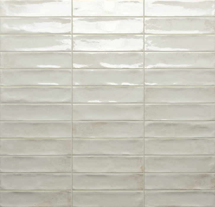 Dettaglio posato piastrella per rivestimento in gres porcellanato effetto mattoncino lucido 4.8x20 cm della collezione Marrakech, colore White di Ceramica Rondine