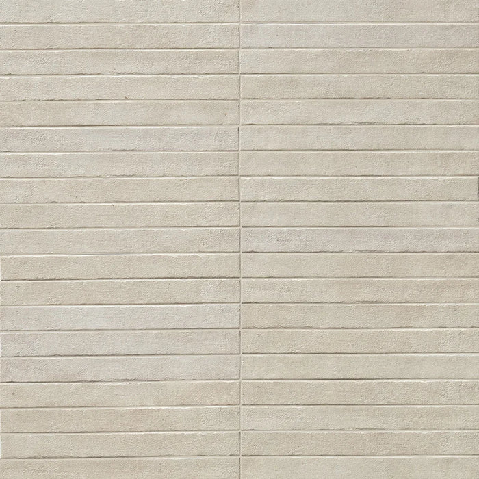 Posato a correre della piastrella per pavimento e rivestimento interno in gres porcellanato effetto mattoncino e graniglia della collezione Mixture di Ceramica Rondine, formato 4.8x45 cm, colore Ivory