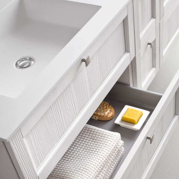 Dettaglio cassetti mobile bagno classico con chiusura rallentata, effetto legno sbiancato lavabo in tekor maniglie alluminio