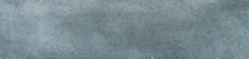 Dettaglio piastrella per rivestimento in gres porcellanato effetto mattoncino lucido 6x25 cm della collezione Mojave, colore Denim di Ceramica Rondine