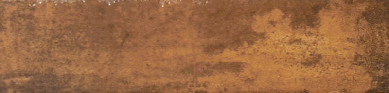 Dettaglio piastrella per rivestimento in gres porcellanato effetto mattoncino lucido 6x25 cm della collezione Mojave, colore Ocra di Ceramica Rondine