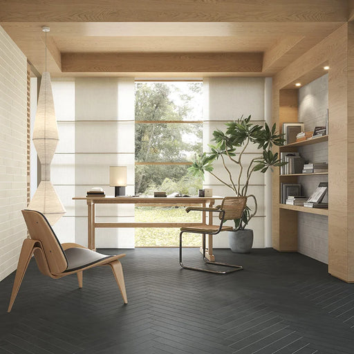 Studio moderno con pavimento in gres porcellanato serie Longarine Brio di Marca Corona, effetto mattoncino, formato 7.5x60, Colore Mora