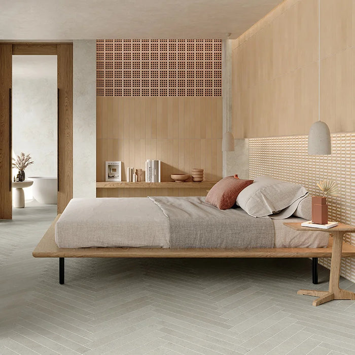 Dettaglio camera da letto con pavimento in gres porcellanato serie Longarine Calcecreta di Marca Corona, effetto mattoncino, formato 7.5x60, Colore Baia