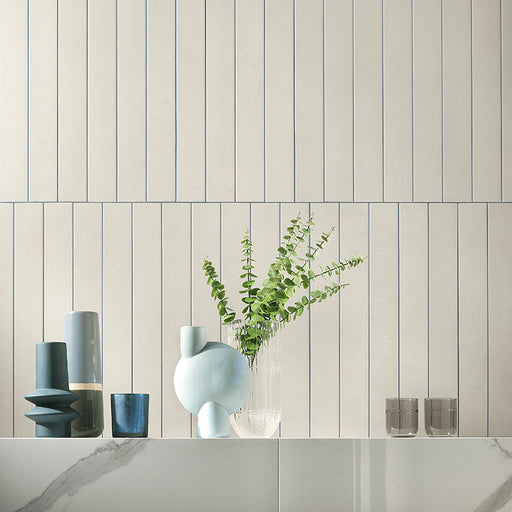 Dettaglio rivestimento in gres porcellanato serie Longarine Brio di Marca Corona, effetto mattoncino, formato 7.5x60, Colore Camelia