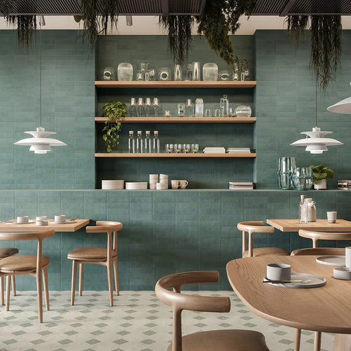 Ristorante con rivestimento in gres porcellanato serie Miniature Cera di Marca Corona, effetto mattoncino vellutato, formato 6x24, Colore Verde Foresta