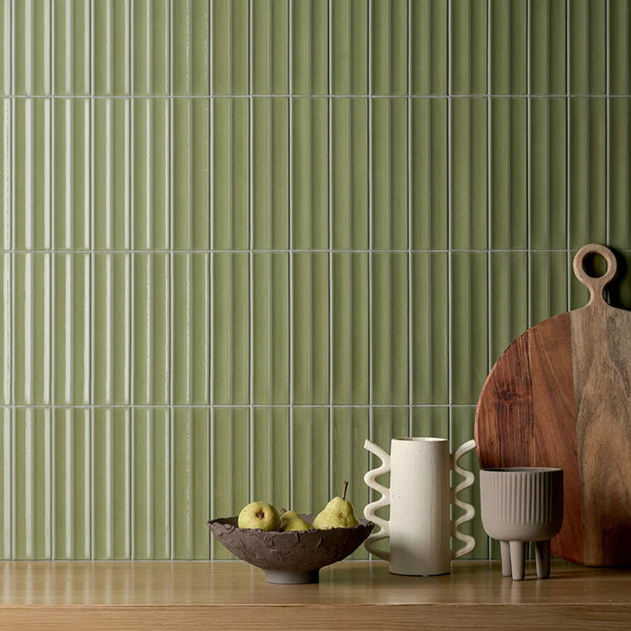 Dettaglio rivestimento in gres porcellanato serie Miniature Rima di Marca Corona, effetto mattoncino 3D, formato 6x24 cm, Colore Posidonia