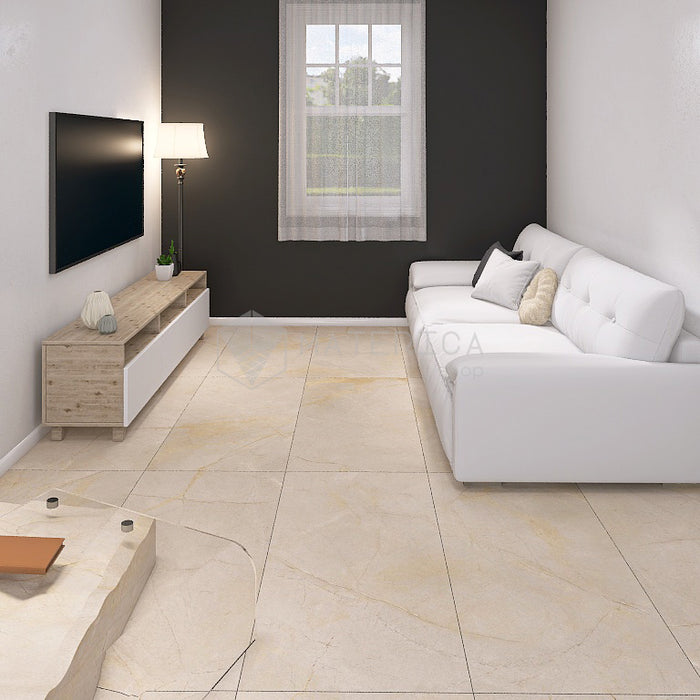 Salotto moderno con pavimento in gres porcellanato effetto pietra naturale della collezione la geoteca nella colorazione Marfil di gardenia orchidea 60x120