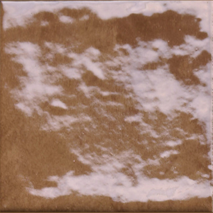 Dettaglio piastrella per rivestimento in gres porcellanato effetto mattoncino lucido 10x10 cm della collezione Marrakech, colore Copper di Ceramica Rondine