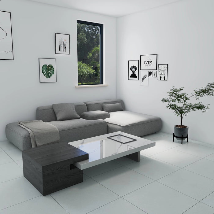 Ambientazione di soggiorno moderno con pavimento in gres porcellanato effetto cemento con bordo rettificato. Mistery White idea ceramica