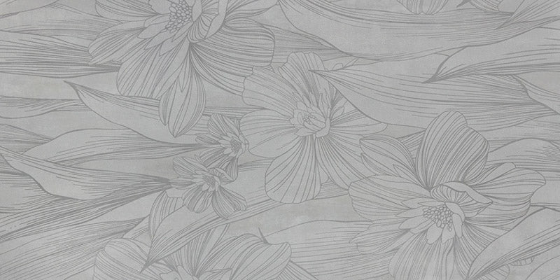 dettaglio piastrella da rivestimento in gres porcellanato smaltato opaco effetto cemento DECORATO FLOREALE con dettagli tono su tono della collezione More! di Paul & Co Ceramiche, formato 60x120, colore Precious Ice
