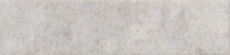 Dettaglio piastrella con rivestimento in gres porcellanato effetto mattoncino opaco 6x25 cm della collezione Noho, colore Light Grey di Ceramica Rondine