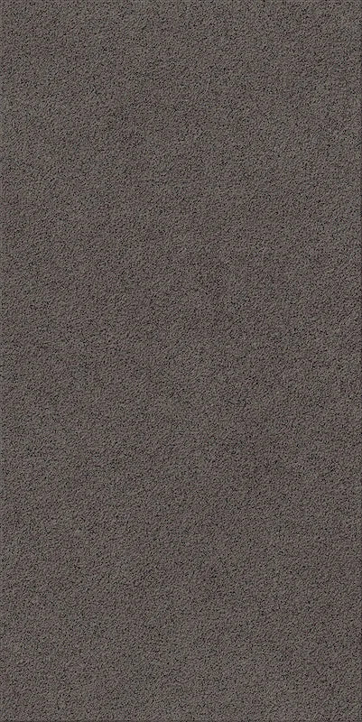 Dettaglio Piastrella da pavimento e rivestimento in gres serie Nok di 41zero42, effetto argilla opaco con texture puntinata, formato 60x120 cm, Colore Grains Antracite