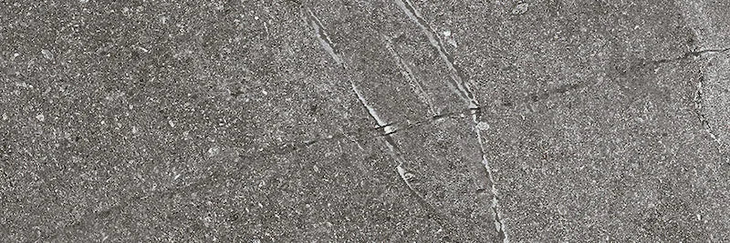 Dettaglio piastrella in gres porcellanato effetto mattoncino in pietra naturale scandinava della Collezione Nordic Stone di Ceramica Settecento, colore Anthracite 10x30