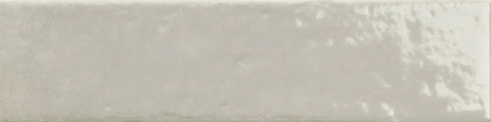 Dettaglio piastrella per rivestimento in gres porcellanato effetto mattoncino lucido 7,5x30 cm della collezione Oxida, colore Clay di Ceramica Settecento