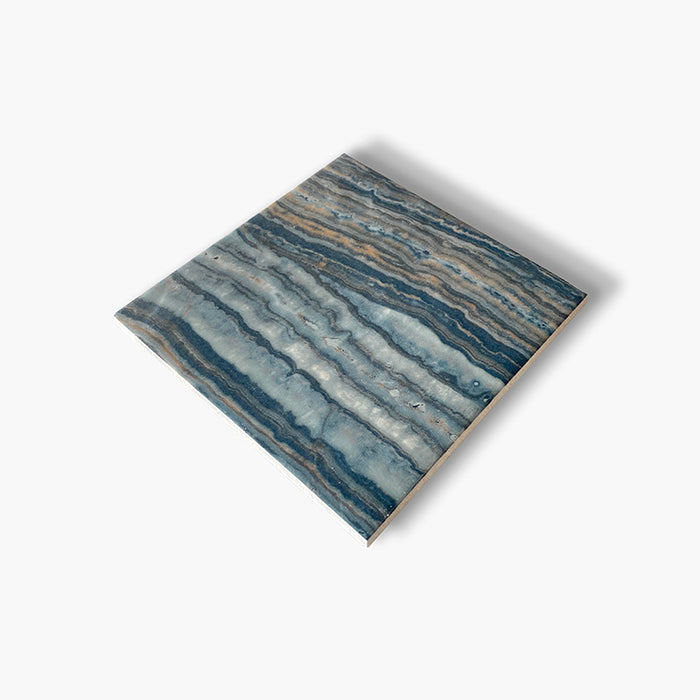 Dettaglio piastrella per pavimento e rivestimento in gres porcellanato effetto pietra spaziale. Collezione Swimming Pool di Ceramica Valsecchia, formato 15x15, Onyx Green