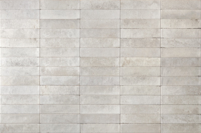 Dettaglio piastrella con rivestimento in gres porcellanato effetto mattoncino opaco 6x25 cm della collezione Noho, colore Light Grey di Ceramica Rondine